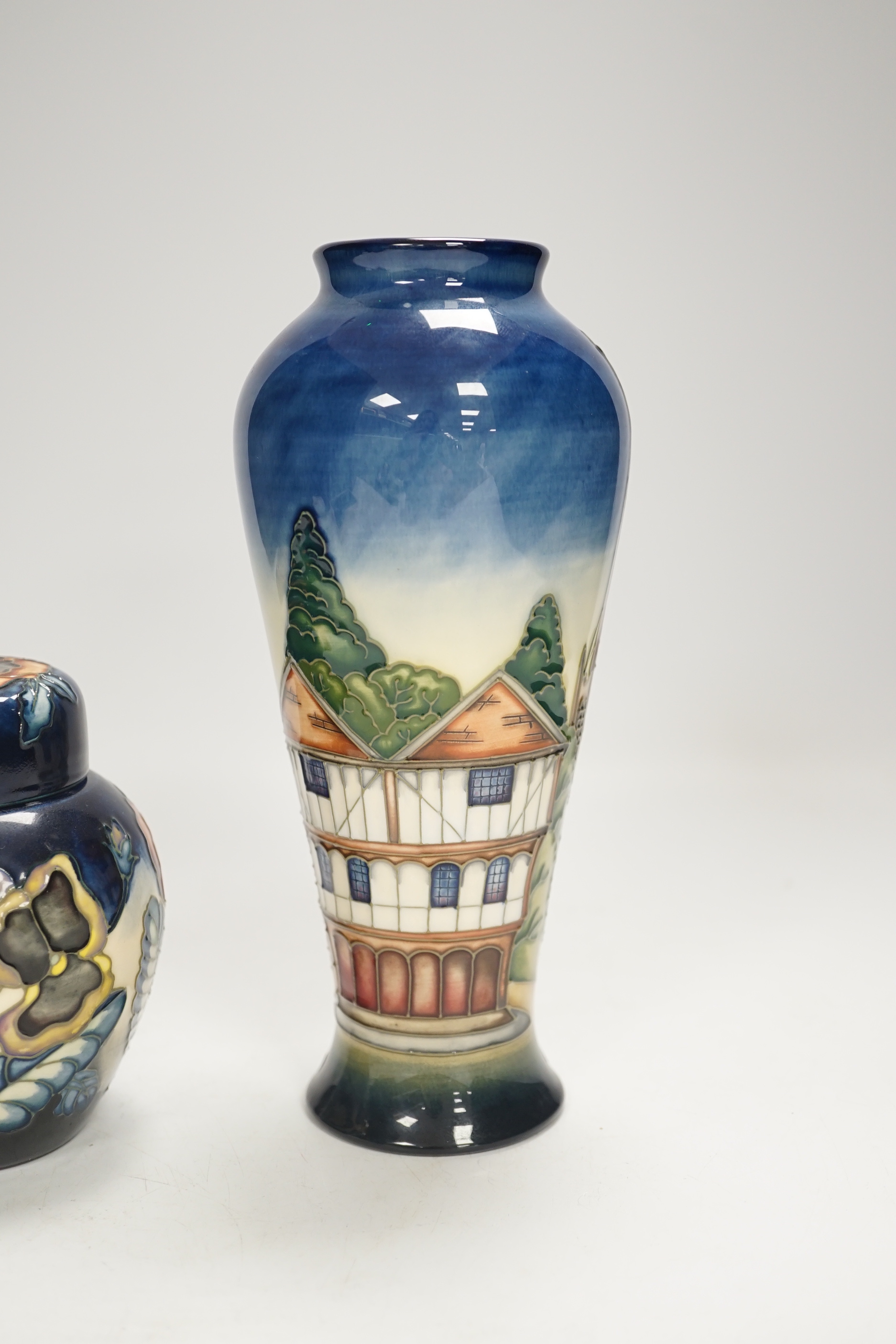 A Moorcroft Pansy ginger jar by Sally Guy, limited edition 18/100 and a Moorcroft ‘Thaxted’ limited edition vase by Philip Gibson, 123/200, largest 20cm high